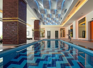 Элитные двухкомнатные апартаменты, 68м², в фешенебельном комплексе в Махмутларе, Алания, 600м от моря ID-19157 фото-24