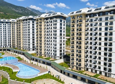 Квартира с двумя спальнями, 78м², с видом на море в комплексе с отельной инфраструктурой в Махмутларе, Алания ID-19161 фото-1