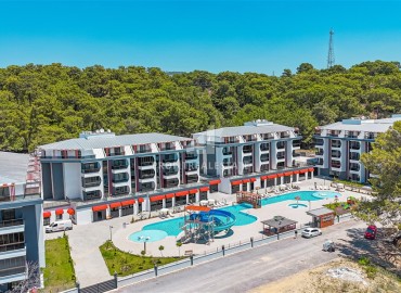Двухкомнатная квартира, 63м², в комфортабельной новостройке с великолепной локацией в районе Алании – Авсаллар ID-19164 фото-1
