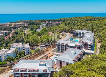 Двухкомнатная квартира, 63м², в комфортабельной новостройке с великолепной локацией в районе Алании – Авсаллар ID-19164 фото-17