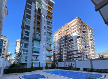 Симпатичная квартира 1+1, 65м², в резиденции с бассейном в 400 метрах от моря в районе Махмутлар, Алания ID-19169 фото-1