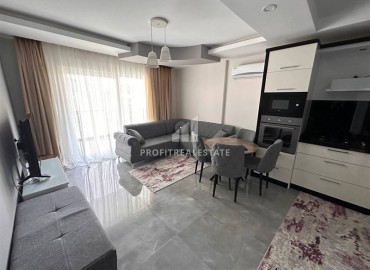 Симпатичная квартира 1+1, 65м², в резиденции с бассейном в 400 метрах от моря в районе Махмутлар, Алания ID-19169 фото-2