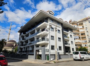 Меблированные двухкомнатные апартаменты, 68м², в новом комплексе с бассейном в центре Алании ID-19175 фото-1