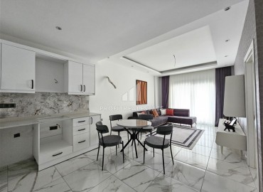 Меблированные двухкомнатные апартаменты, 68м², в новом комплексе с бассейном в центре Алании ID-19175 фото-3
