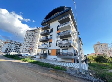 Апартаменты 1+1, 52м², с чистовой отделкой в резиденции с инфраструктурой в центре Махмутлара, Алания ID-19176 фото-1