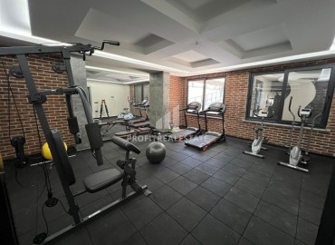 Апартаменты 1+1, 52м², с чистовой отделкой в резиденции с инфраструктурой в центре Махмутлара, Алания ID-19176 фото-9