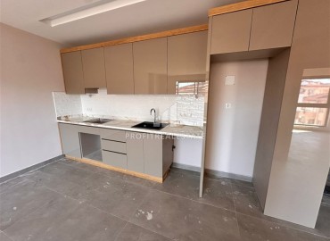 Двухкомнатные апартаменты, 65м² с видом на горы в новом доме городского типа в центре Алании ID-19180 фото-3