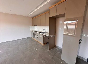 Двухкомнатные апартаменты, 65м² с видом на горы в новом доме городского типа в центре Алании ID-19180 фото-6