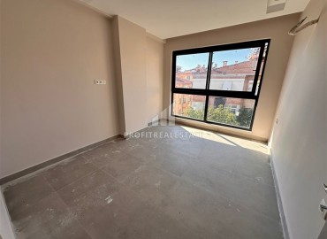 Двухкомнатные апартаменты, 65м² с видом на горы в новом доме городского типа в центре Алании ID-19180 фото-8