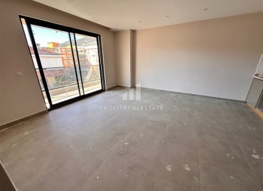 Двухкомнатные апартаменты, 65м² с видом на горы в новом доме городского типа в центре Алании ID-19180 фото-9
