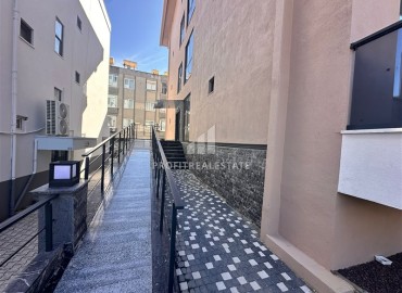 Двухкомнатные апартаменты, 65м² с видом на горы в новом доме городского типа в центре Алании ID-19180 фото-15