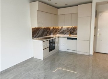 Апартаменты с одной спальней, 55м², в новом фешенебельном комплексе в районе Тосмур, Алания, в 100м от моря ID-19183 фото-2