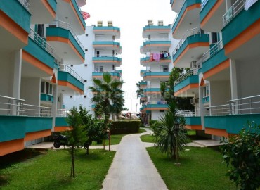 Меблированные апартаменты планировки 2+1, готовые к заселению в 50 метрах от песчаных пляжей в Махмутларе! ID-1522 фото-3