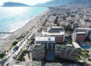 Фешенебельная квартира 1+1, 47,5м², в комфортабельном комплексе на первой береговой линии; Алания, Оба ID-19185 фото-1