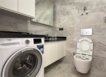 Новая видовая квартира с двумя спальнями, 70м², с отличной локацией в центре Махмутлара, Алания, в 100м от моря ID-19186 фото-8