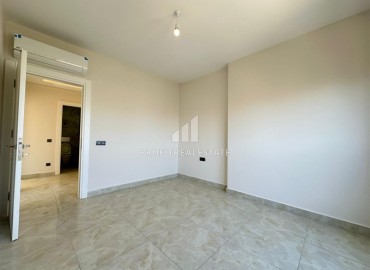 Новая видовая квартира с двумя спальнями, 70м², с отличной локацией в центре Махмутлара, Алания, в 100м от моря ID-19186 фото-13
