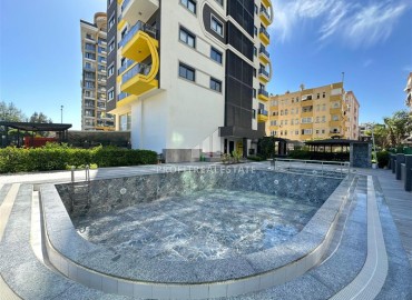 Новая видовая квартира с двумя спальнями, 70м², с отличной локацией в центре Махмутлара, Алания, в 100м от моря ID-19186 фото-15