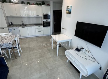 Видовые меблированные апартаменты 1+1, 65м², на высоком этаже в элитном комплексе в 500м от моря в Махмутларе, Алания ID-19194 фото-2