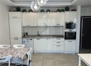Видовые меблированные апартаменты 1+1, 65м², на высоком этаже в элитном комплексе в 500м от моря в Махмутларе, Алания ID-19194 фото-3