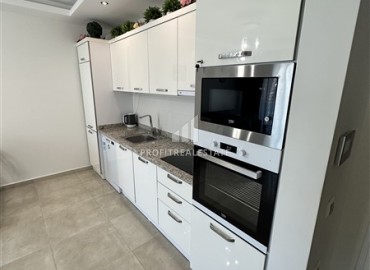 Видовые меблированные апартаменты 1+1, 65м², на высоком этаже в элитном комплексе в 500м от моря в Махмутларе, Алания ID-19194 фото-4