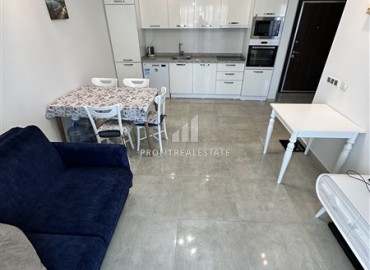 Видовые меблированные апартаменты 1+1, 65м², на высоком этаже в элитном комплексе в 500м от моря в Махмутларе, Алания ID-19194 фото-5