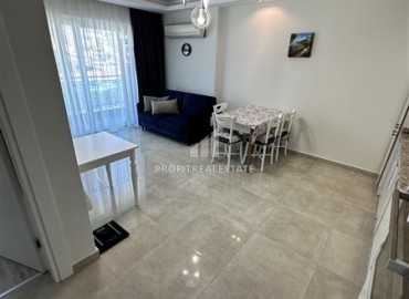 Видовые меблированные апартаменты 1+1, 65м², на высоком этаже в элитном комплексе в 500м от моря в Махмутларе, Алания ID-19194 фото-8