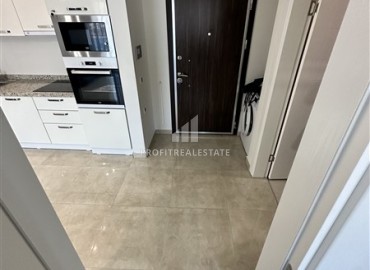 Видовые меблированные апартаменты 1+1, 65м², на высоком этаже в элитном комплексе в 500м от моря в Махмутларе, Алания ID-19194 фото-10