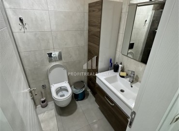 Видовые меблированные апартаменты 1+1, 65м², на высоком этаже в элитном комплексе в 500м от моря в Махмутларе, Алания ID-19194 фото-12
