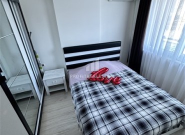 Видовые меблированные апартаменты 1+1, 65м², на высоком этаже в элитном комплексе в 500м от моря в Махмутларе, Алания ID-19194 фото-16
