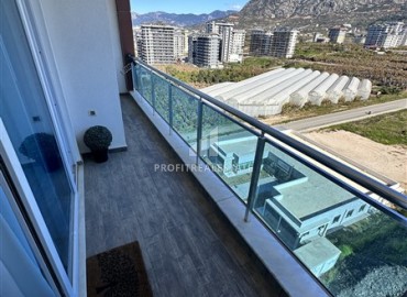 Видовые меблированные апартаменты 1+1, 65м², на высоком этаже в элитном комплексе в 500м от моря в Махмутларе, Алания ID-19194 фото-17