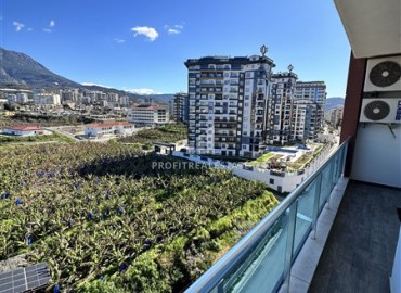 Видовые меблированные апартаменты 1+1, 65м², на высоком этаже в элитном комплексе в 500м от моря в Махмутларе, Алания ID-19194 фото-18