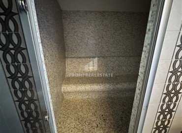 Видовые меблированные апартаменты 1+1, 65м², на высоком этаже в элитном комплексе в 500м от моря в Махмутларе, Алания ID-19194 фото-27