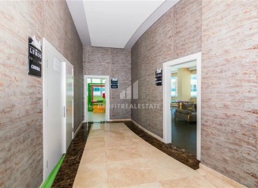 Видовые меблированные апартаменты 1+1, 65м², на высоком этаже в элитном комплексе в 500м от моря в Махмутларе, Алания ID-19194 фото-31