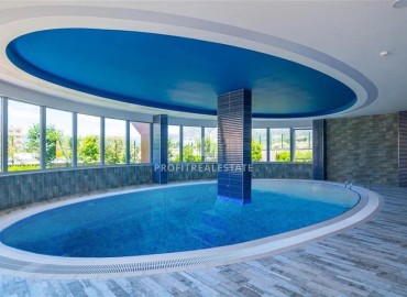 Видовые меблированные апартаменты 1+1, 65м², на высоком этаже в элитном комплексе в 500м от моря в Махмутларе, Алания ID-19194 фото-39
