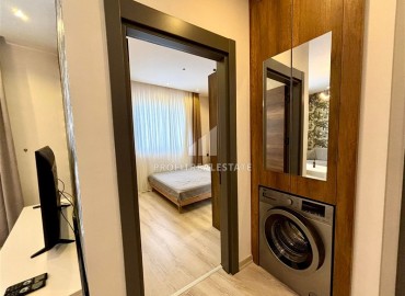 Элегантные двухкомнатные апартаменты, 55м², в элитном комплексе в 500м от моря в Махмутларе, Алания ID-19195 фото-4