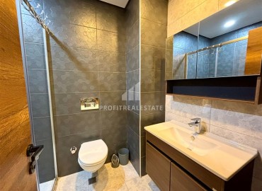 Элегантные двухкомнатные апартаменты, 55м², в элитном комплексе в 500м от моря в Махмутларе, Алания ID-19195 фото-5