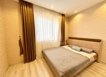 Элегантные двухкомнатные апартаменты, 55м², в элитном комплексе в 500м от моря в Махмутларе, Алания ID-19195 фото-6