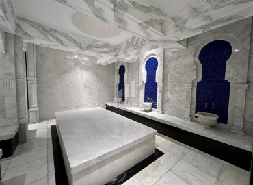 Элегантные двухкомнатные апартаменты, 55м², в элитном комплексе в 500м от моря в Махмутларе, Алания ID-19195 фото-11