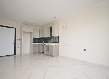 Двухкомнатные апартаменты, 55м², с видом на море и горы в новом комплексе премиум класса в районе Алании - Демирташ ID-19196 фото-2