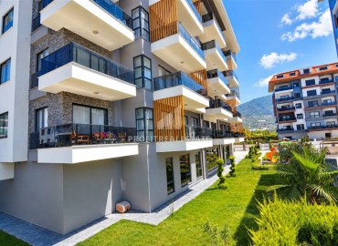 Апартаменты с одной спальней, 57м², в новой комфортабельной резиденции в 150м от моря в районе Кестель, Алания ID-19201 фото-16
