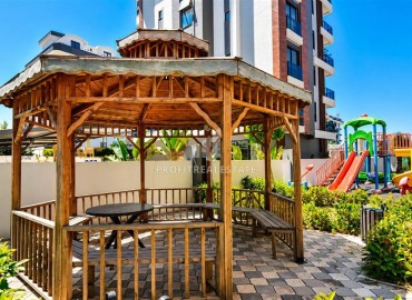 Апартаменты с одной спальней, 57м², в новой комфортабельной резиденции в 150м от моря в районе Кестель, Алания ID-19201 фото-21