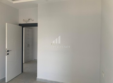 Двухкомнатные апартаменты, 50м², с чистовой отделкой в новом комфортабельном комплексе в Авсалларе, Алания ID-19203 фото-5