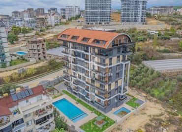 Двухкомнатные апартаменты, 50м², с чистовой отделкой в новом комфортабельном комплексе в Авсалларе, Алания ID-19203 фото-11