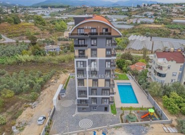 Двухкомнатные апартаменты, 50м², с чистовой отделкой в новом комфортабельном комплексе в Авсалларе, Алания ID-19203 фото-14