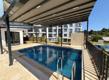 Стильная квартира с одной спальней, 55м², в современном комплексе с комфортной инфраструктурой в районе Оба, Алания ID-19205 фото-16