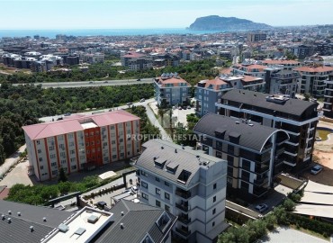 Стильная квартира с одной спальней, 55м², в современном комплексе с комфортной инфраструктурой в районе Оба, Алания ID-19205 фото-20