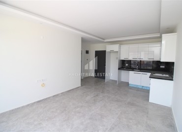 Двухкомнатная квартира, 55м², в комфортабельной новостройке с инфраструктурой в Махмутларе, Алания, в 500м от моря ID-19209 фото-2