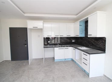 Двухкомнатная квартира, 55м², в комфортабельной новостройке с инфраструктурой в Махмутларе, Алания, в 500м от моря ID-19209 фото-3