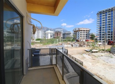 Двухкомнатная квартира, 55м², в комфортабельной новостройке с инфраструктурой в Махмутларе, Алания, в 500м от моря ID-19209 фото-10