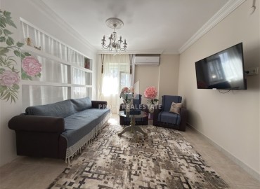 Меблированная квартира с двумя спальнями, 100м², в доме с парковкой в районе Махмутлар, Алания ID-19211 фото-1